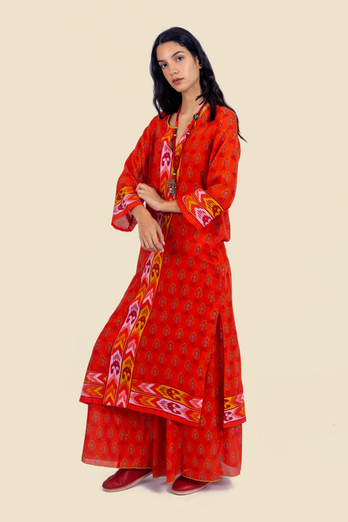 Tunic dress in printed cotton gauze with side slits